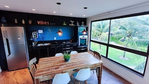 Comfort Apartment | Private kitchen | Fridge, microwave, cookware/dishes/utensils, freezer