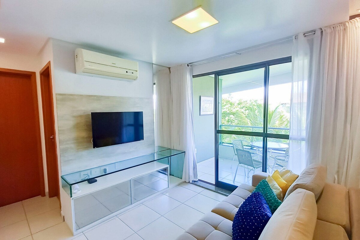 Family Apartment, Multiple Beds, Pool View | Living area | TV