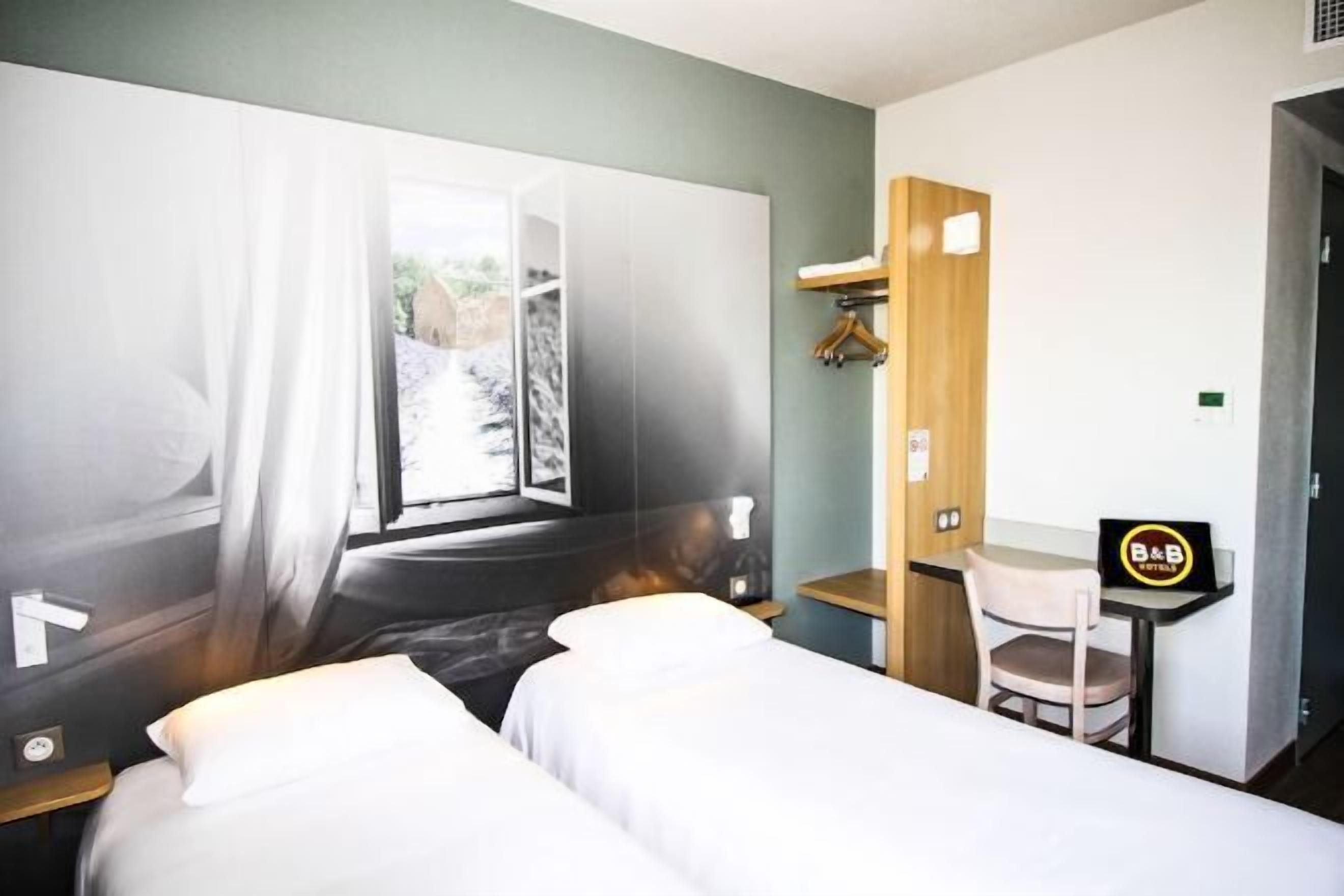Premium bedding, desk, blackout drapes, soundproofing