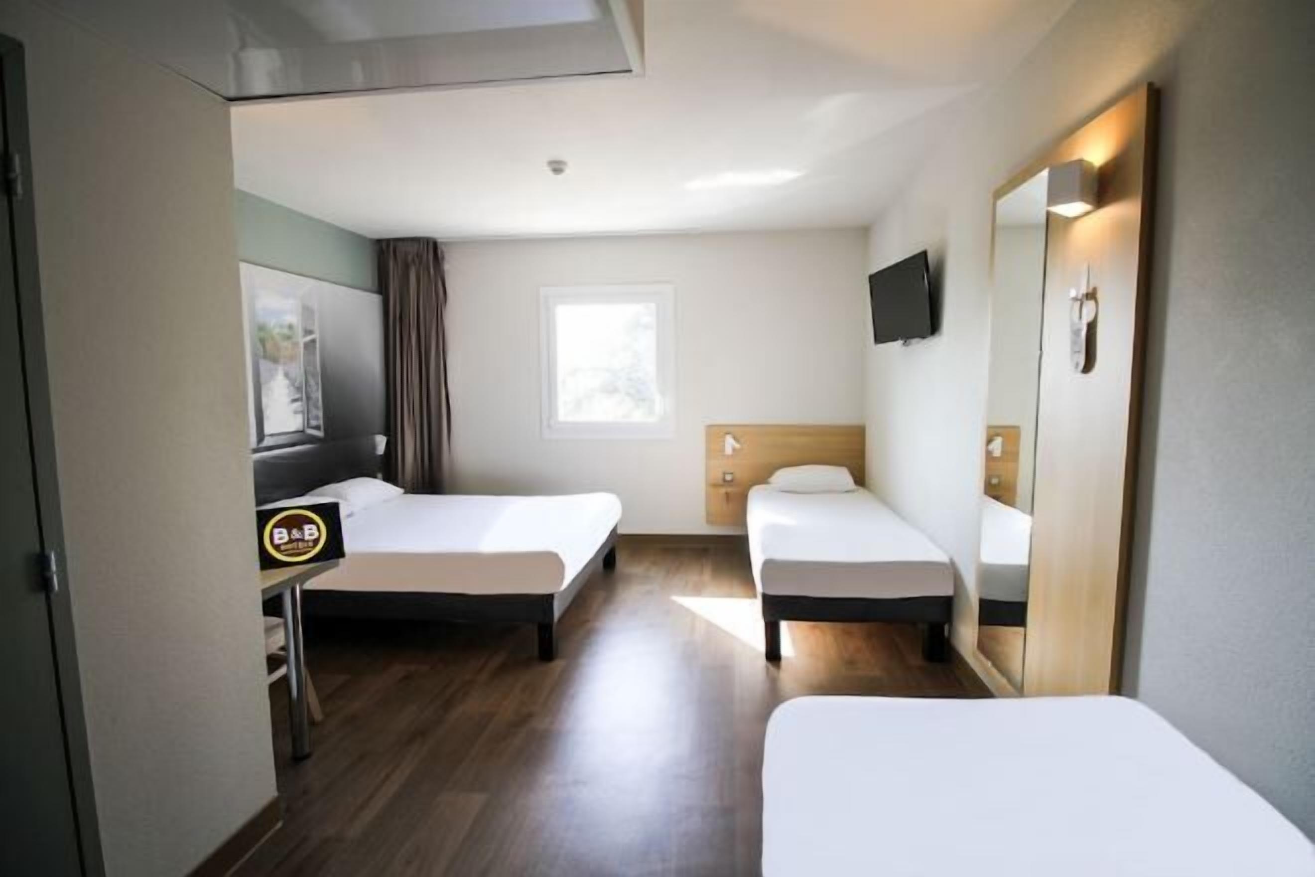 Premium bedding, desk, blackout drapes, soundproofing