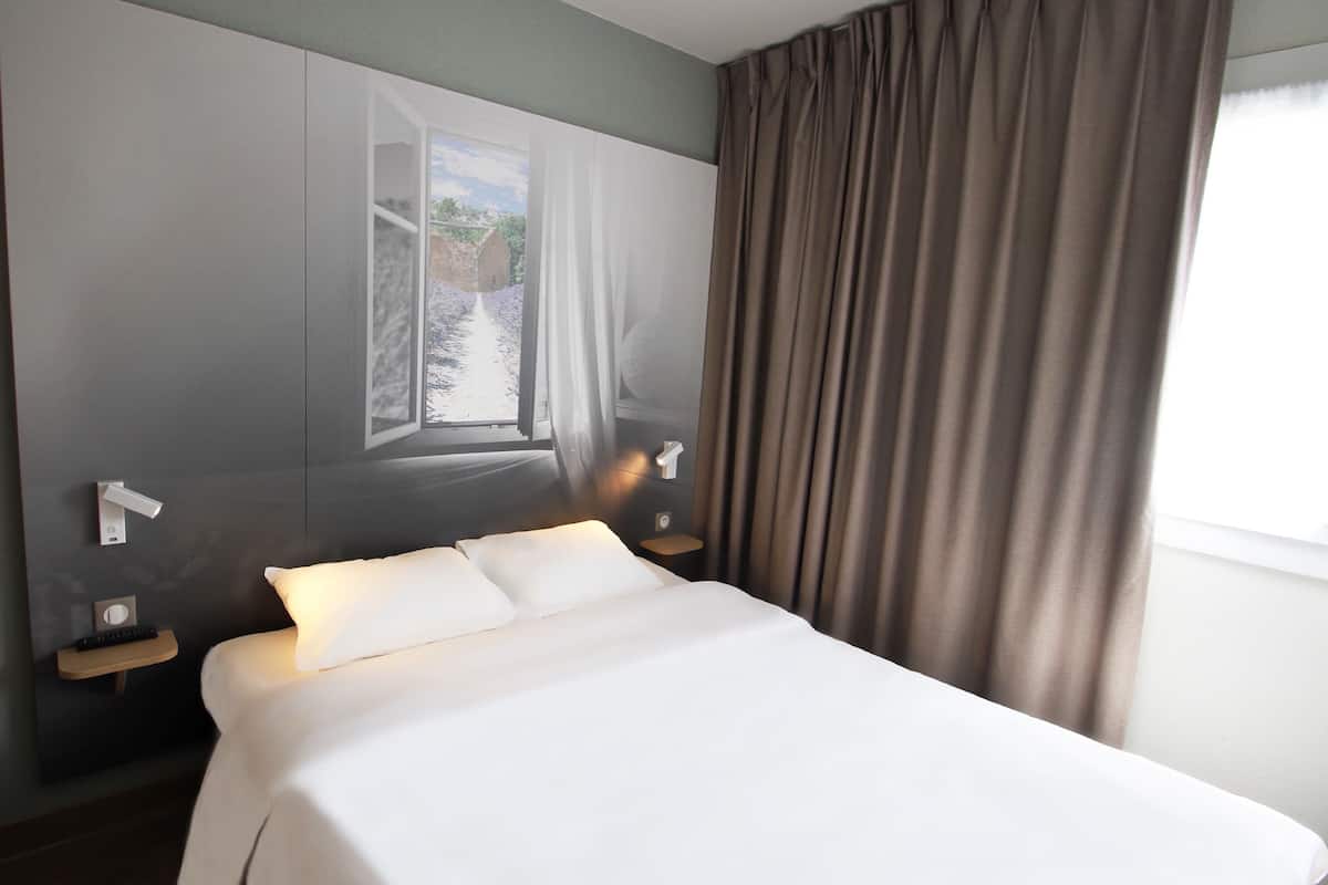 Premium bedding, desk, blackout curtains, soundproofing