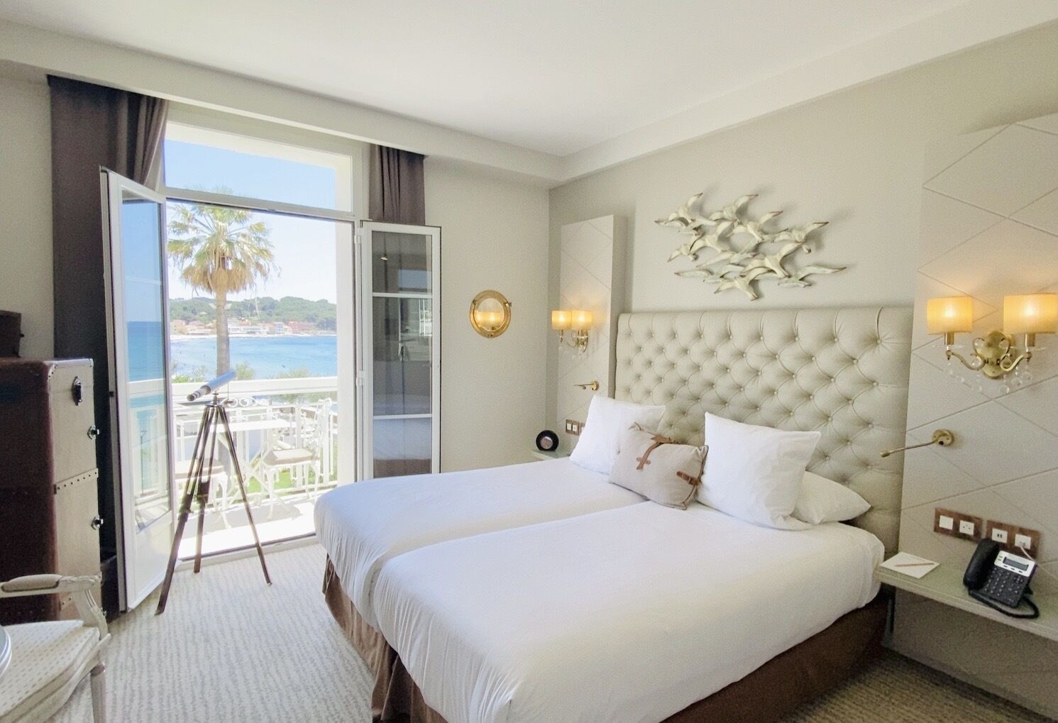 Deluxe Room, 1 King Bed, Partial Sea View | Minibar, in-room safe, blackout drapes, soundproofing