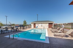 Seasonal outdoor pool, open 6:00 AM to 10:00 PM, sun loungers