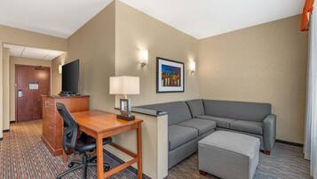 Desk, laptop workspace, blackout drapes, iron/ironing board