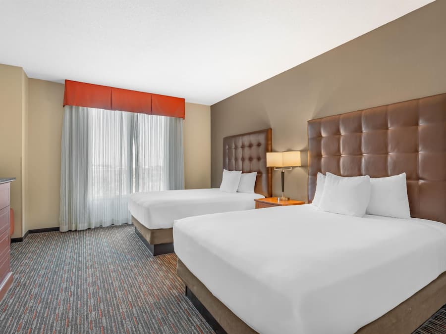 Desk, laptop workspace, blackout drapes, iron/ironing board