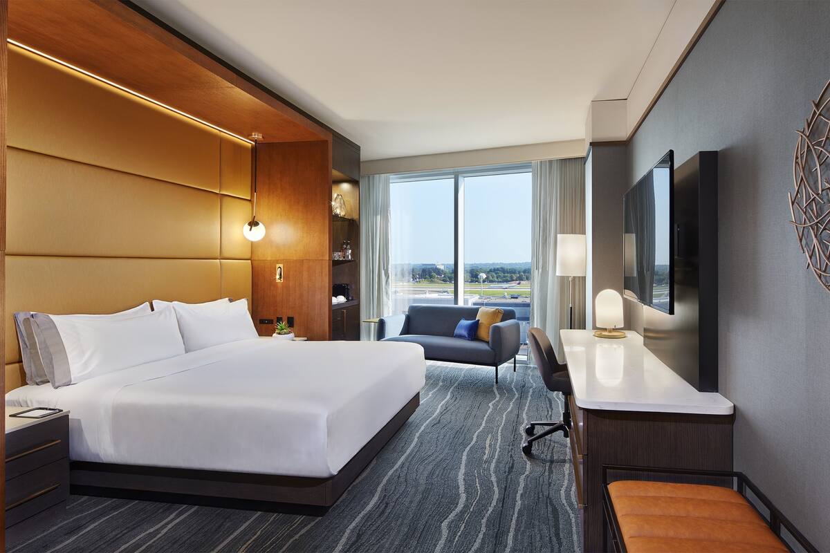 Premium bedding, down duvets, pillow-top beds, in-room safe