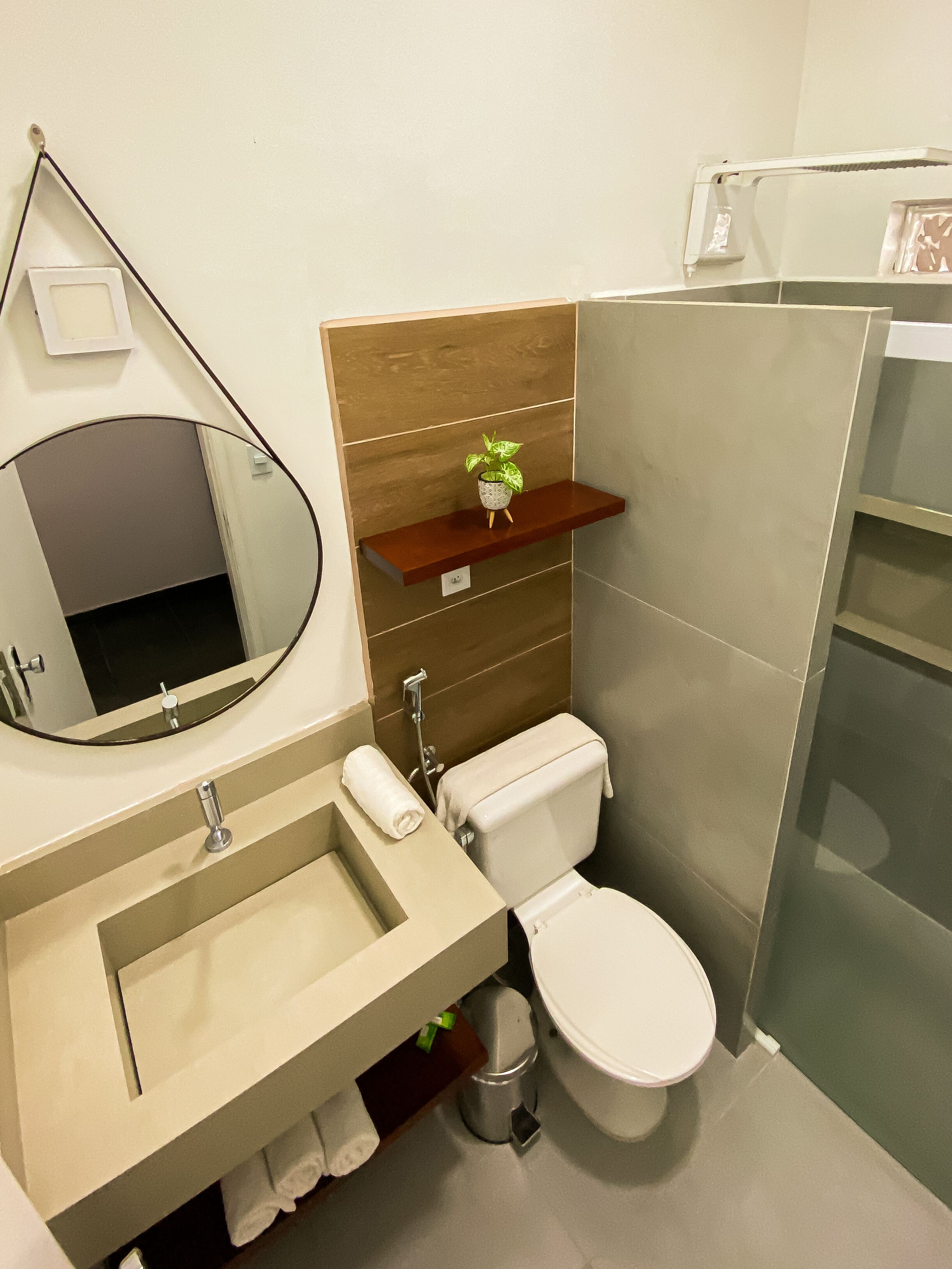 deluxe room | bathroom | shower, rainfall showerhead, towels