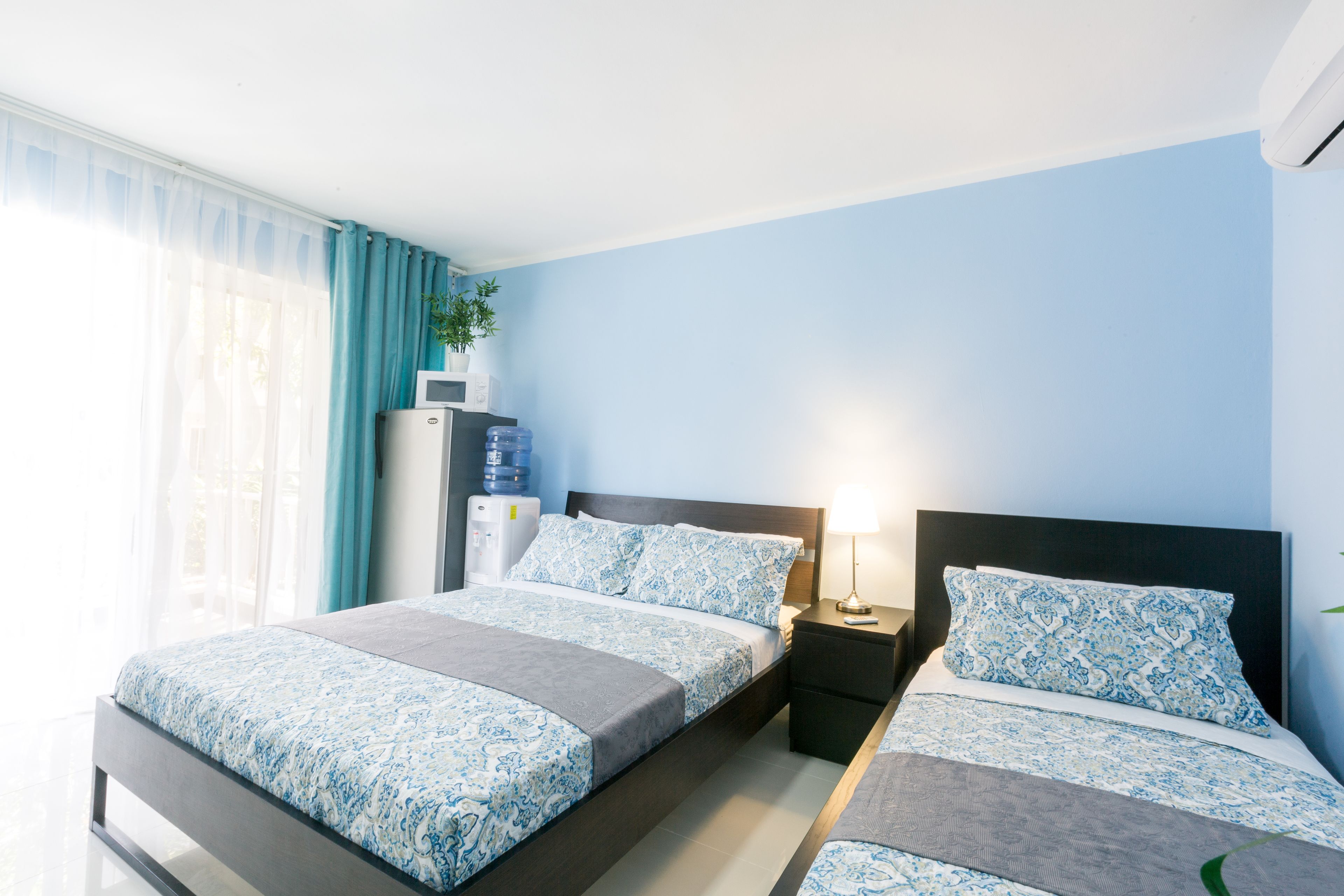 deluxe studio, pool view, poolside | 1 bedroom, in-room safe, desk, laptop workspace