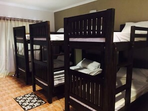 Bed in 6-Bed Mixed Dormitory Room | Desk, iron/ironing board, cots/infant beds