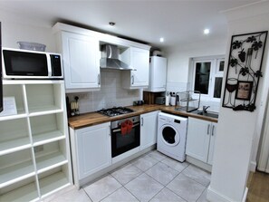 Estudio, baño compartido (Private Kitchen) | Cocina privada