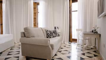 Luxe kamer, niet-roken (iglesia) | Italiaanse Frette-lakens, luxe beddengoed, donsdekens, een minibar