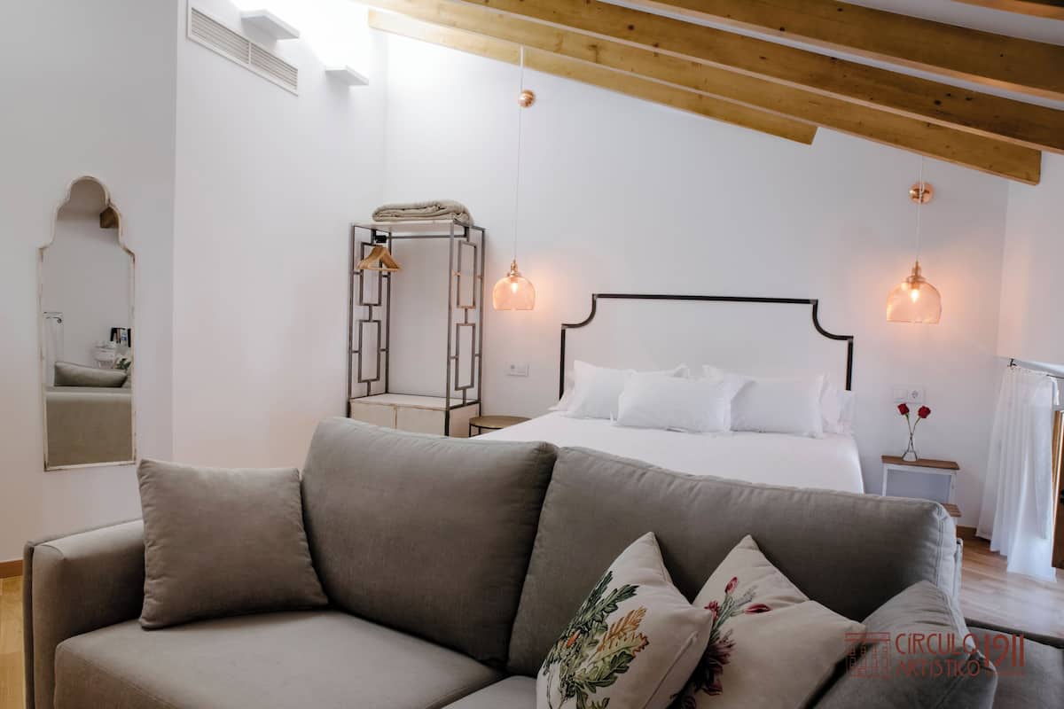 Frette Italian sheets, premium bedding, down duvets, minibar