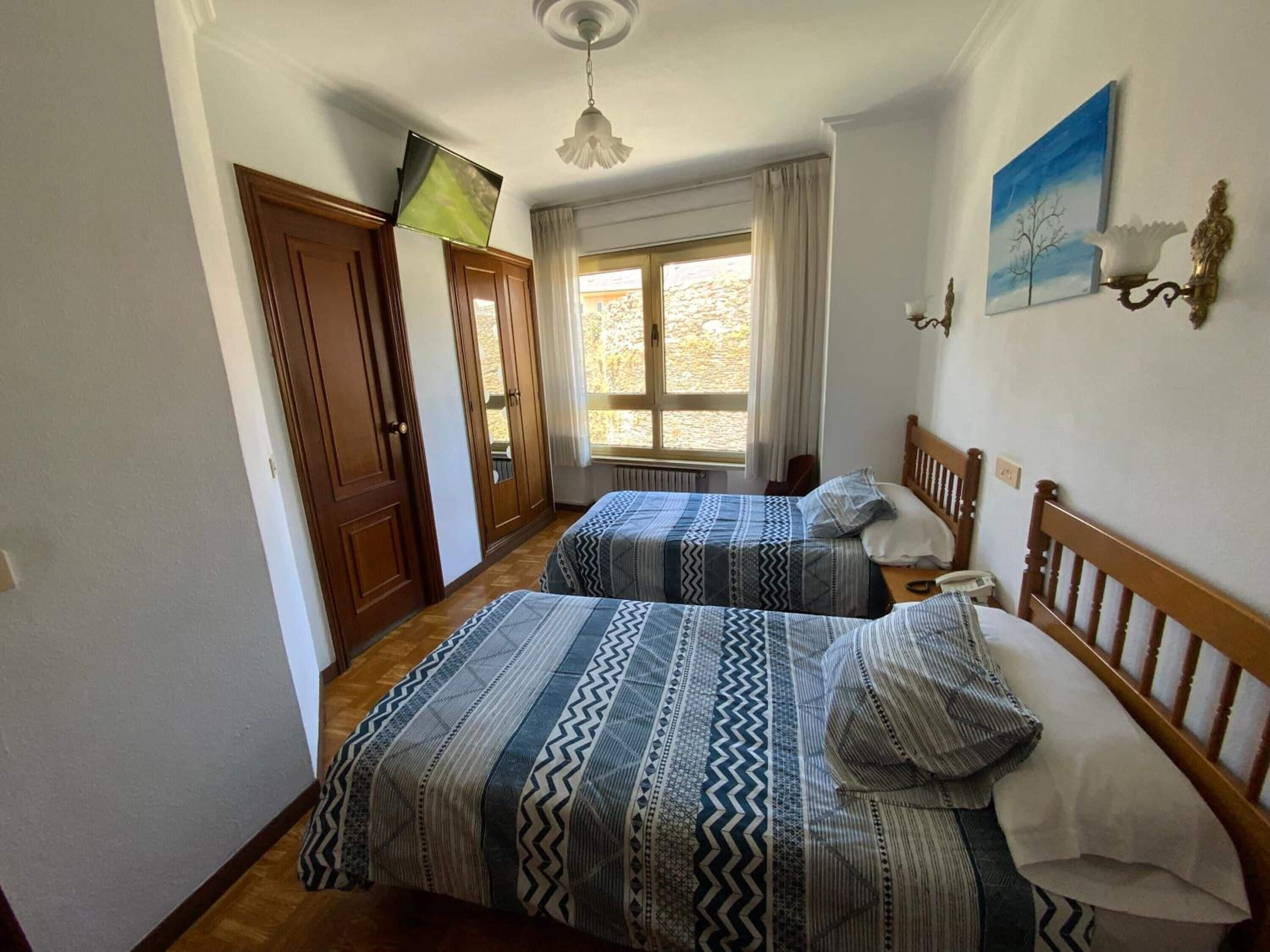 desk, blackout curtains, cots/infant beds, free wifi