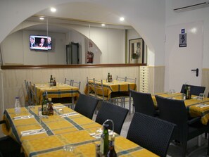 Breakfast, lunch served; international cuisine, al fresco dining
