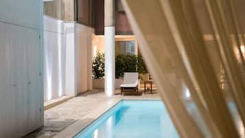 Seasonal outdoor pool, pool umbrellas, pool loungers