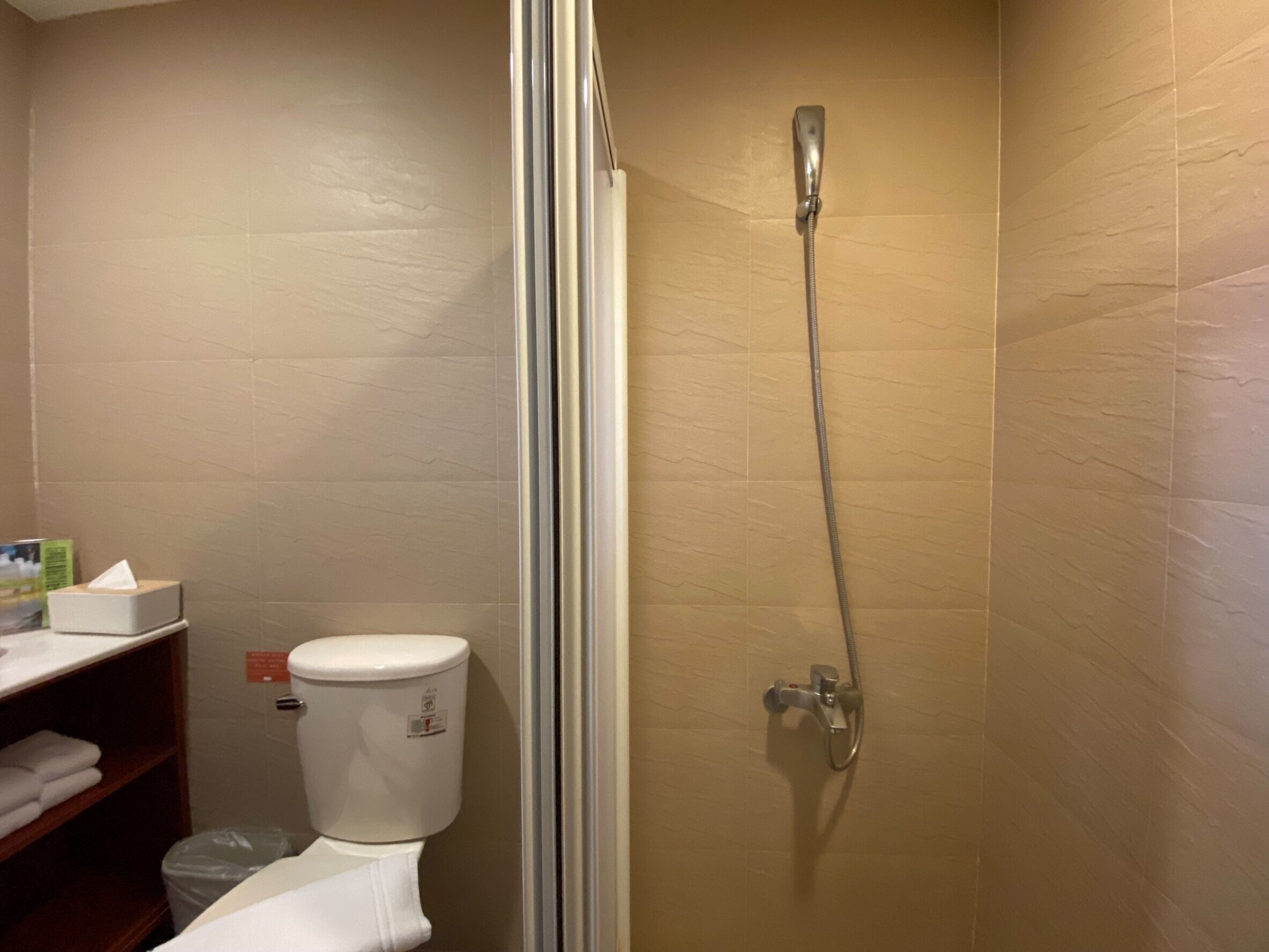 shower, rainfall showerhead, hair dryer, slippers