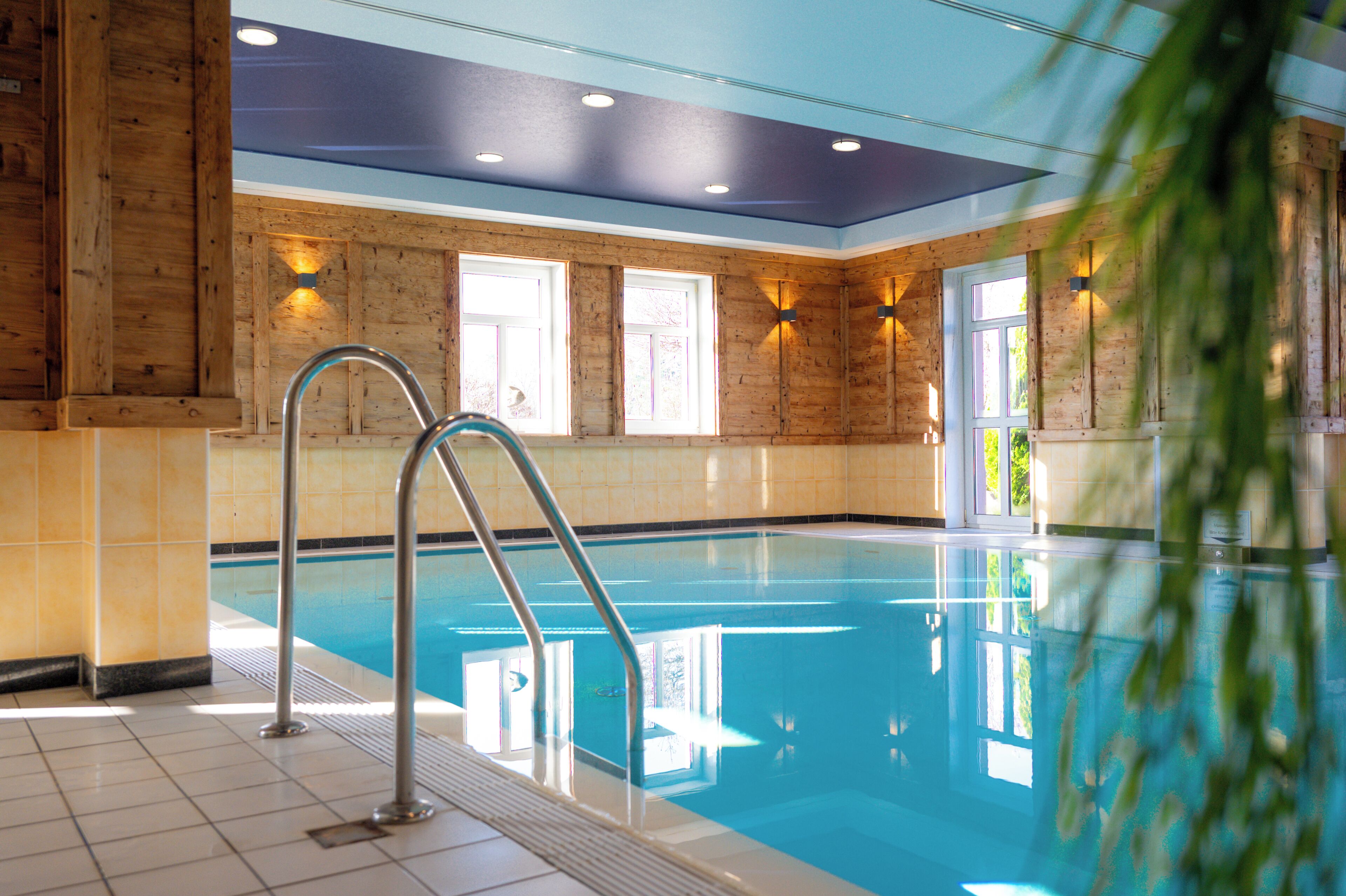 Indoor pool, outdoor pool, pool umbrellas, pool loungers