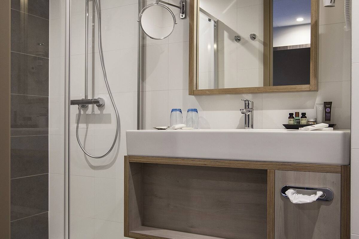 shower, eco-friendly toiletries, hair dryer, towels