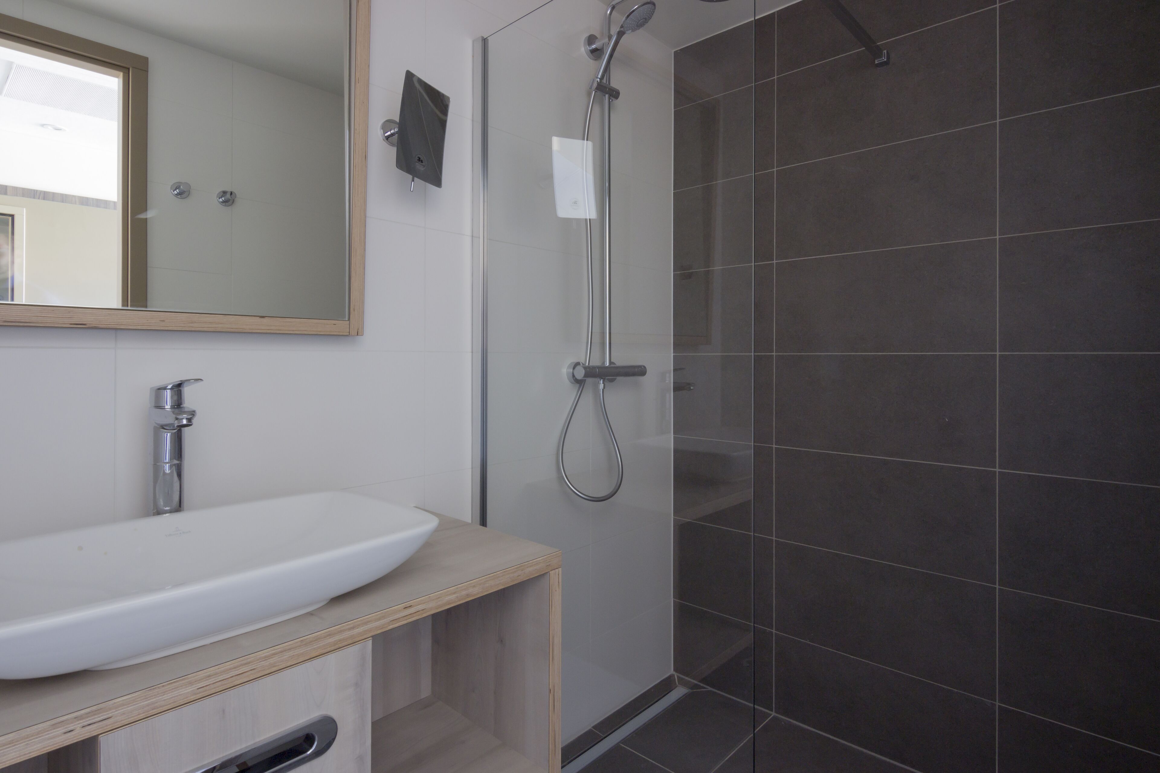 shower, eco-friendly toiletries, hair dryer, towels