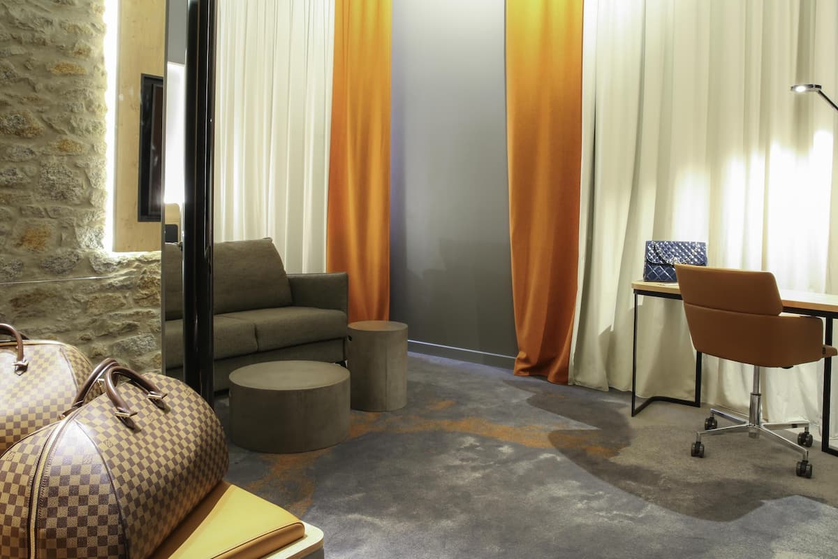 Junior Suite, 1 Queen Bed with Sofa bed | In-room safe, desk, soundproofing, iron/ironing board