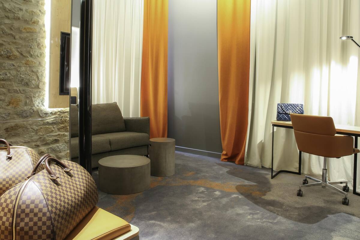 Junior Suite, 1 Queen Bed with Sofa bed | In-room safe, desk, soundproofing, iron/ironing board