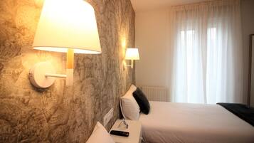 Twin Room | Premium bedding, desk, blackout drapes, iron/ironing board