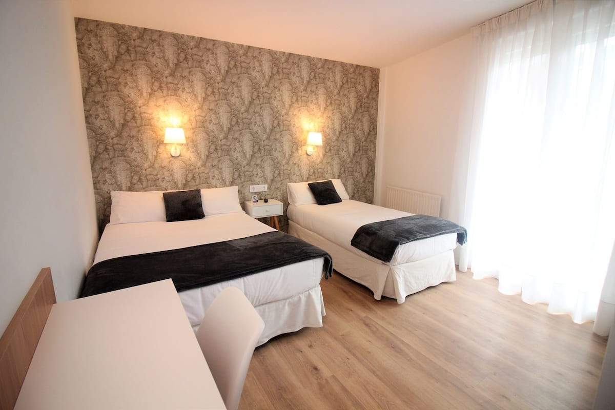 Premium bedding, desk, blackout curtains, iron/ironing board