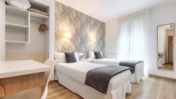 Twin Room | Premium bedding, desk, blackout drapes, iron/ironing board