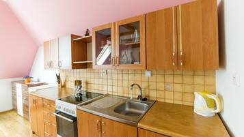 Apartment, Balcony (1st floor) | Private kitchen | Fridge, electric kettle