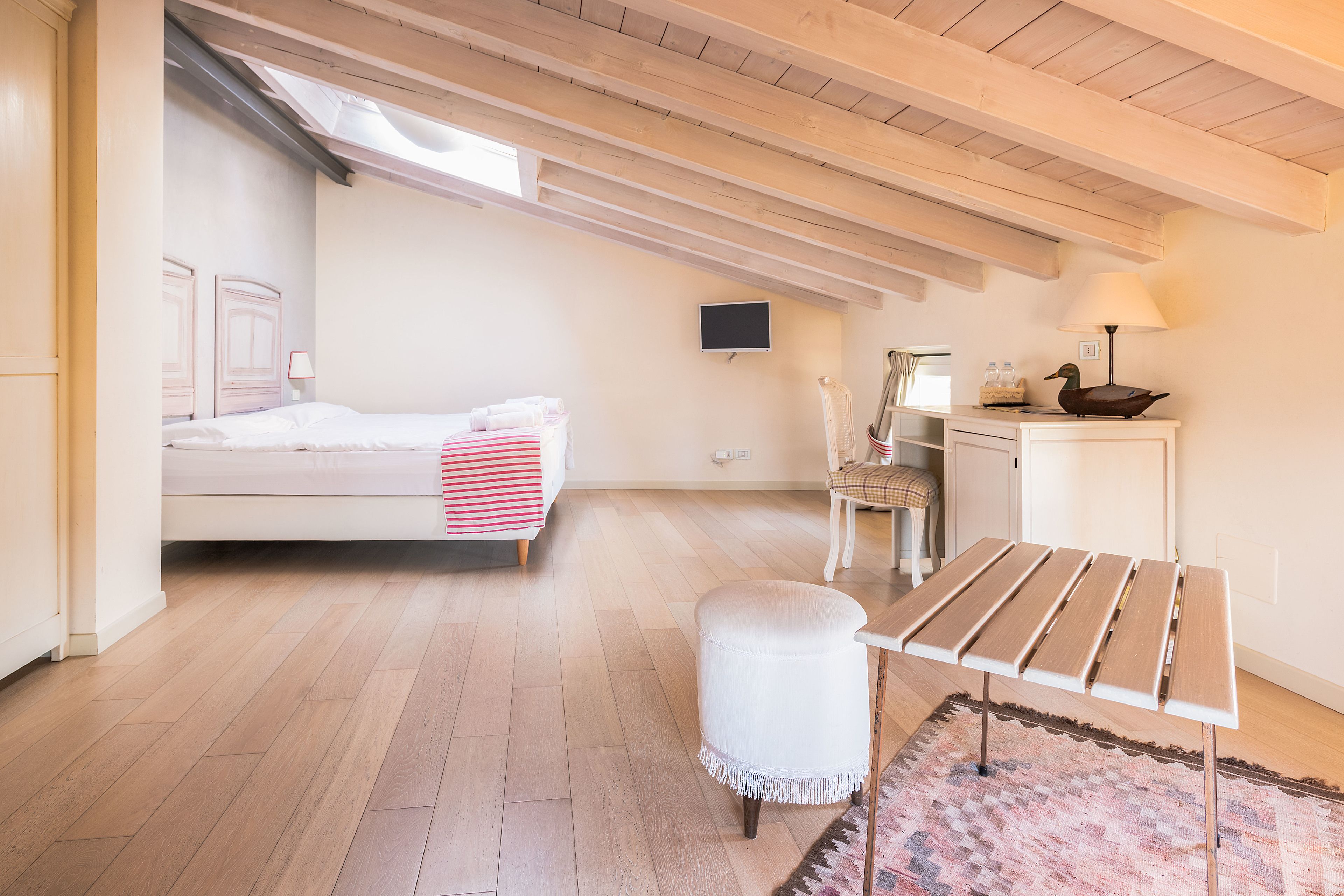 standard quadruple room, 1 bedroom | in-room safe, individually decorated, desk, blackout curtains