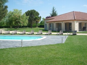 Seasonal outdoor pool, a waterfall pool