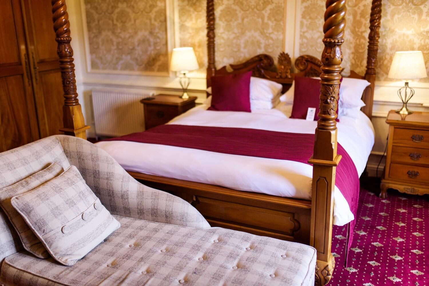 feature room | premium bedding, desk, iron/ironing board, rollaway beds