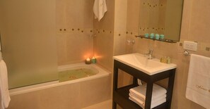 Combined shower/tub, free toiletries, hair dryer, bathrobes