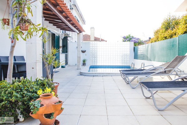 Outdoor pool, open 8 AM to midnight, pool umbrellas, sun loungers