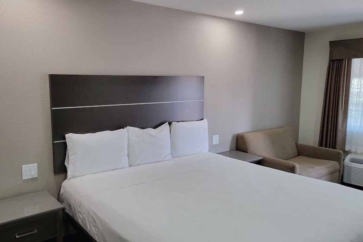 Desk, blackout curtains, iron/ironing board, rollaway beds