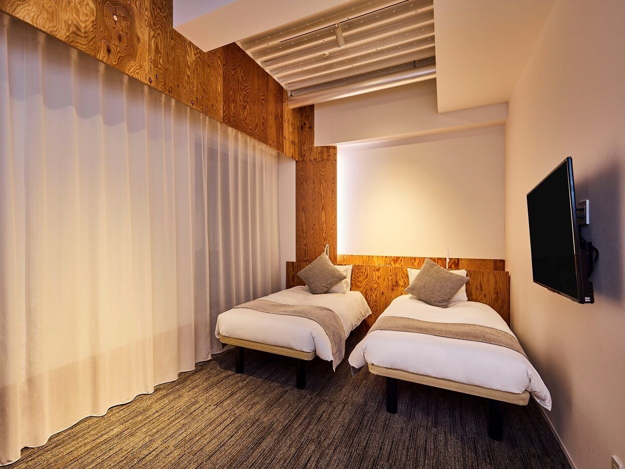 Design Twin kamer, niet-roken (Universal Twin) | Donzen dekbedden, een kluis op de kamer, verduisterende gordijnen