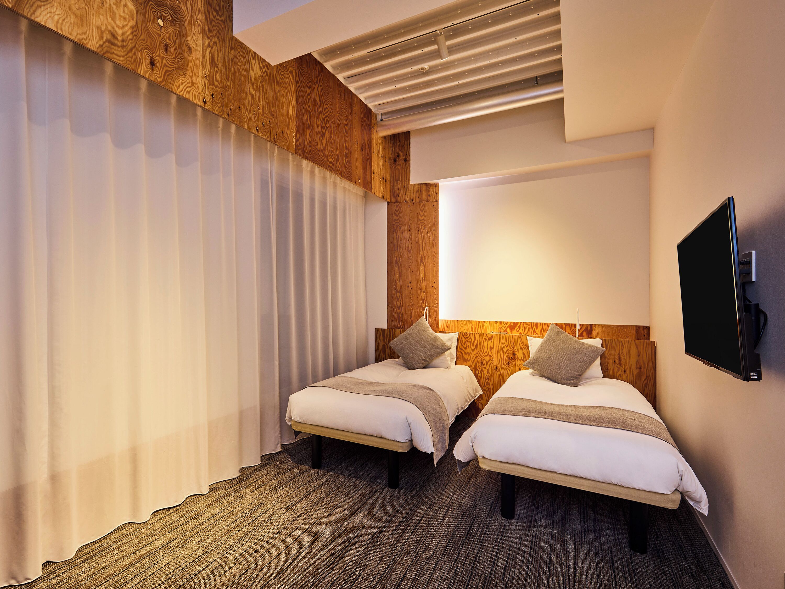 Phòng 2 giường đơn có thiết kế đặc sắc, không hút thuốc (Universal Twin) | Chăn bông, két bảo mật tại phòng, màn/rèm cản sáng 