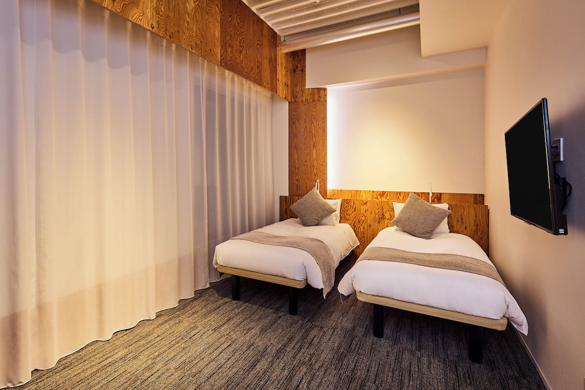 Quarto duplo design, para não fumantes (Universal Twin) | 1 quarto, roupas de cama premium, edredons de pluma, cofres nos quartos