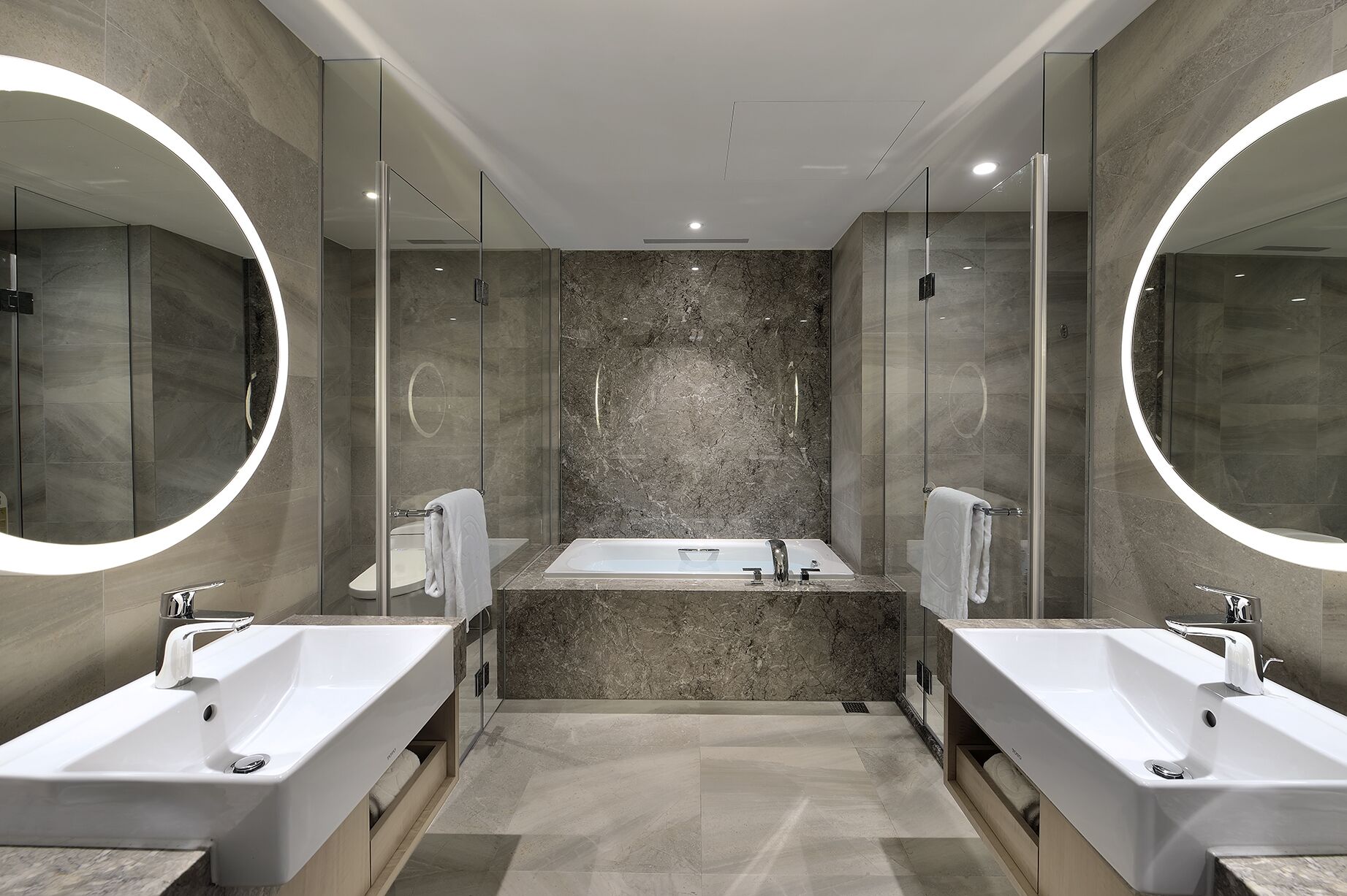 separate bathtub and shower, hair dryer, towels, shampoo