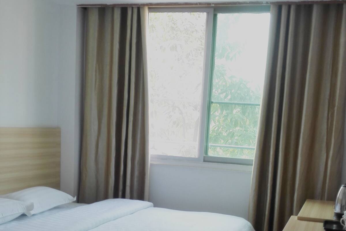 Desk, blackout curtains, free WiFi