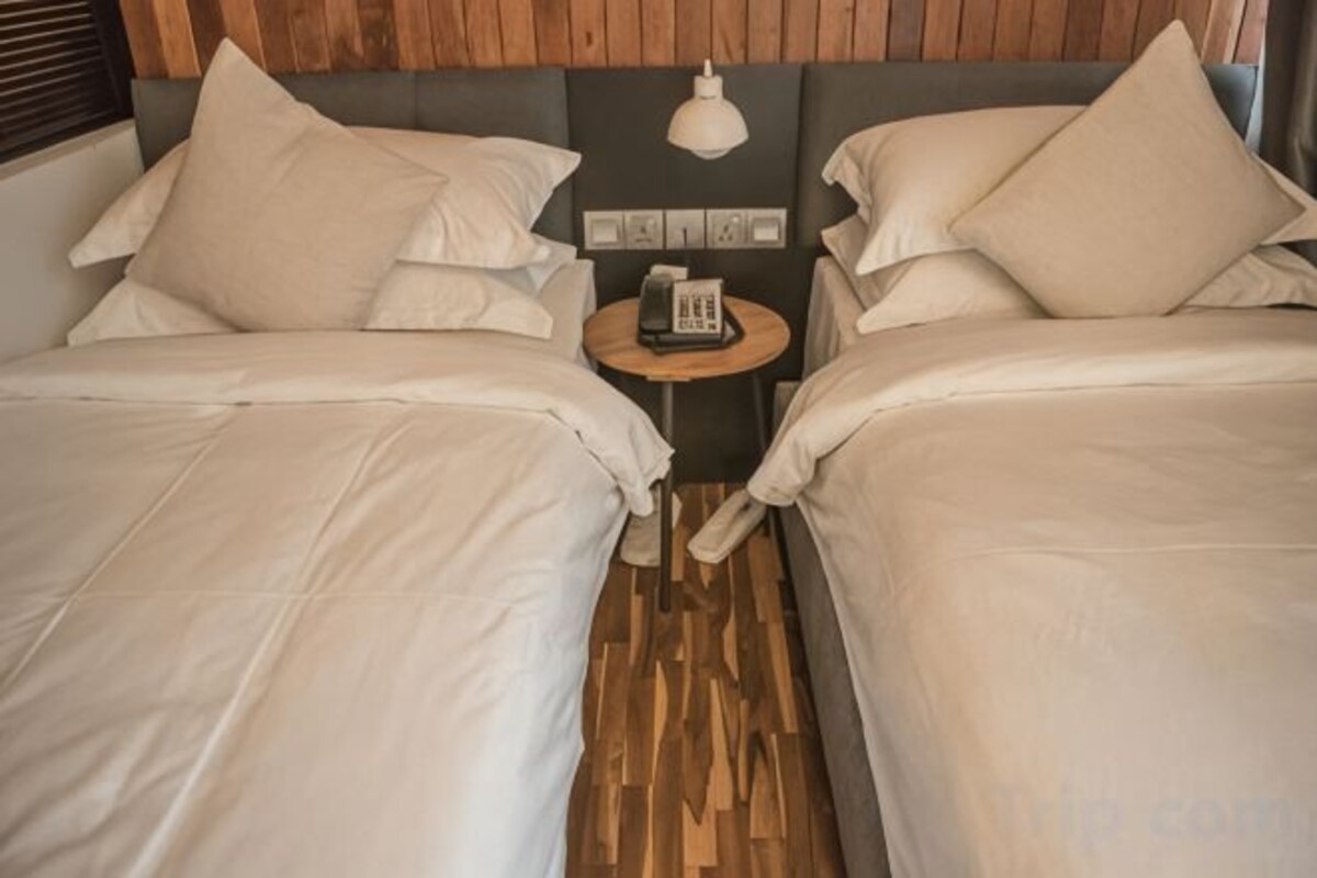Iron/ironing board (on request), WiFi (free), bed sheets