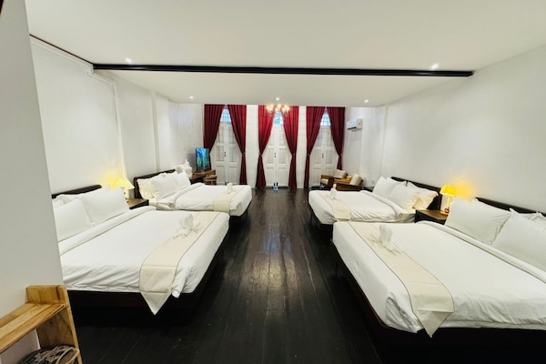 Suite, Balcony, City View | Iron/ironing board, free WiFi, bed sheets