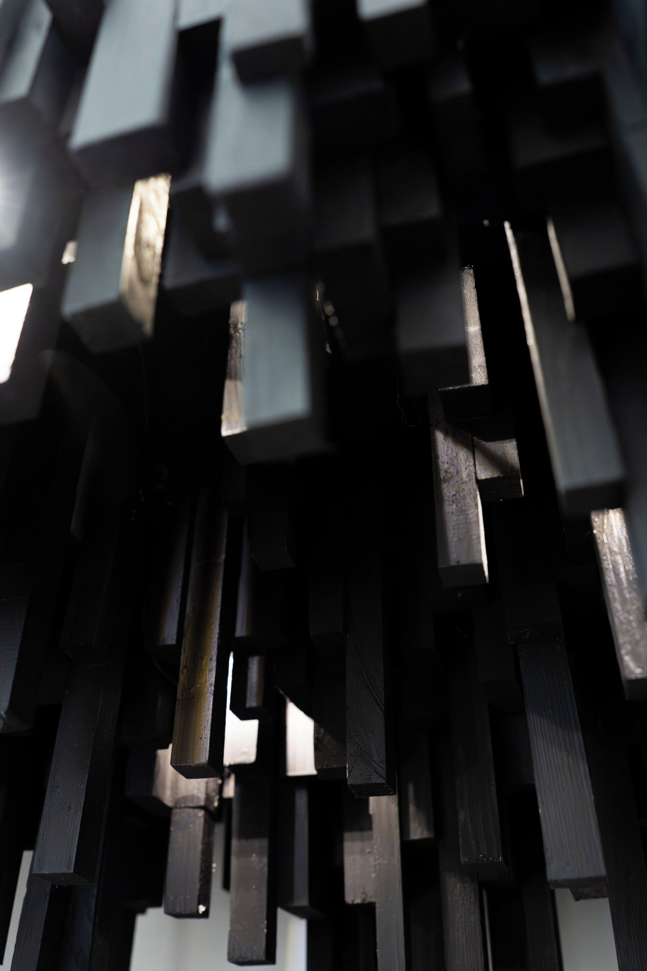 A close-up of a mechanical or industrial structure with various metal components and gears.