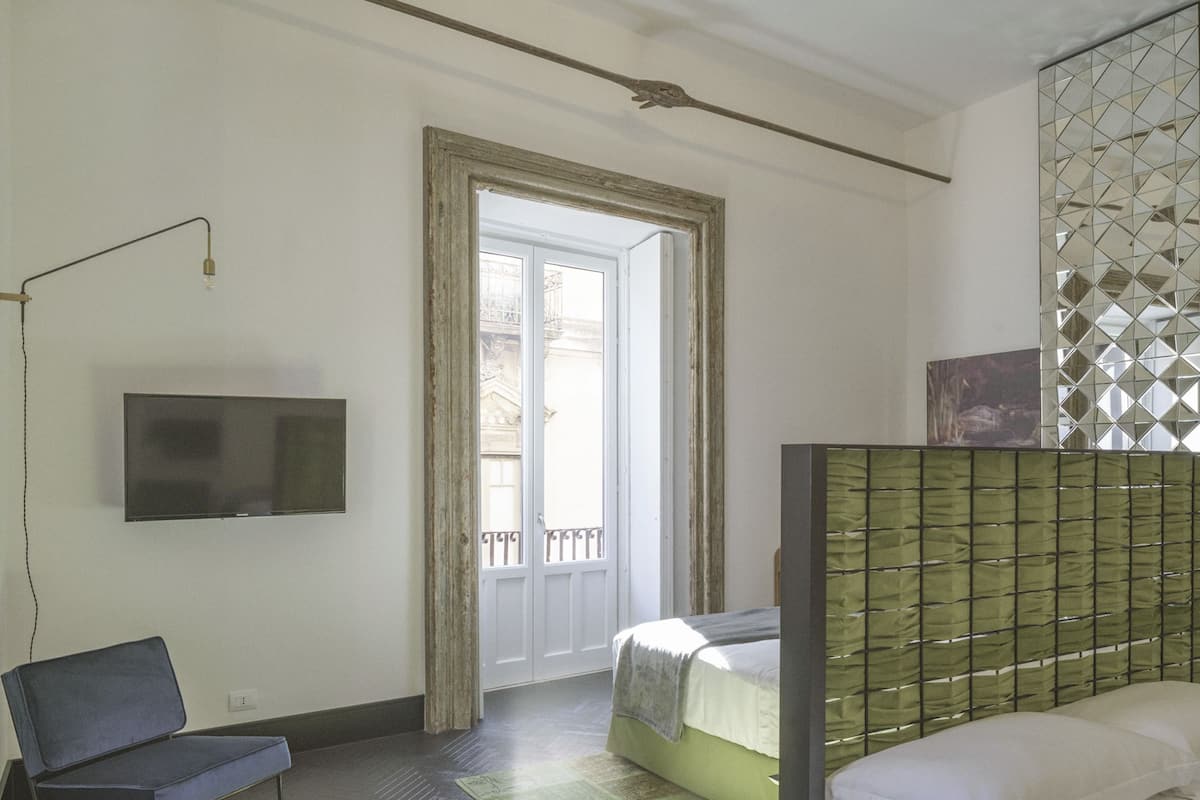 Junior Suite, Balcony, City View | 1 bedroom, premium bedding, minibar, in-room safe