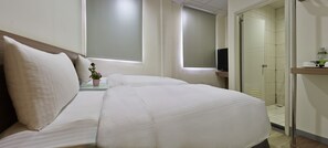Standard Twin Room | Desk, blackout drapes, free WiFi - West 59 Inn  (Taipei)