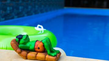 Outdoor pool, open 9 AM to 7 PM, sun loungers