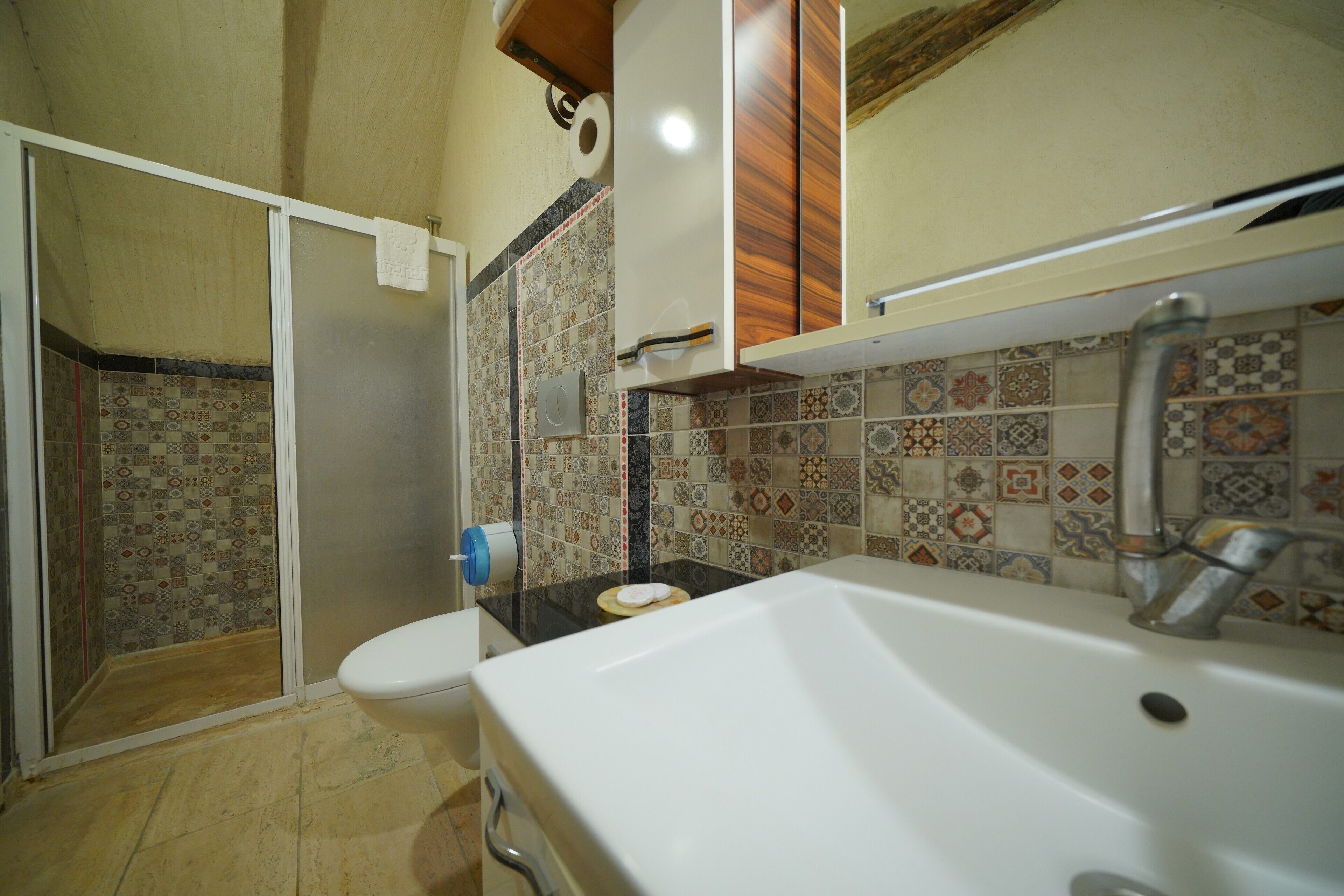 standard room (cave) | bathroom | eco-friendly toiletries, hair dryer, bathrobes, slippers