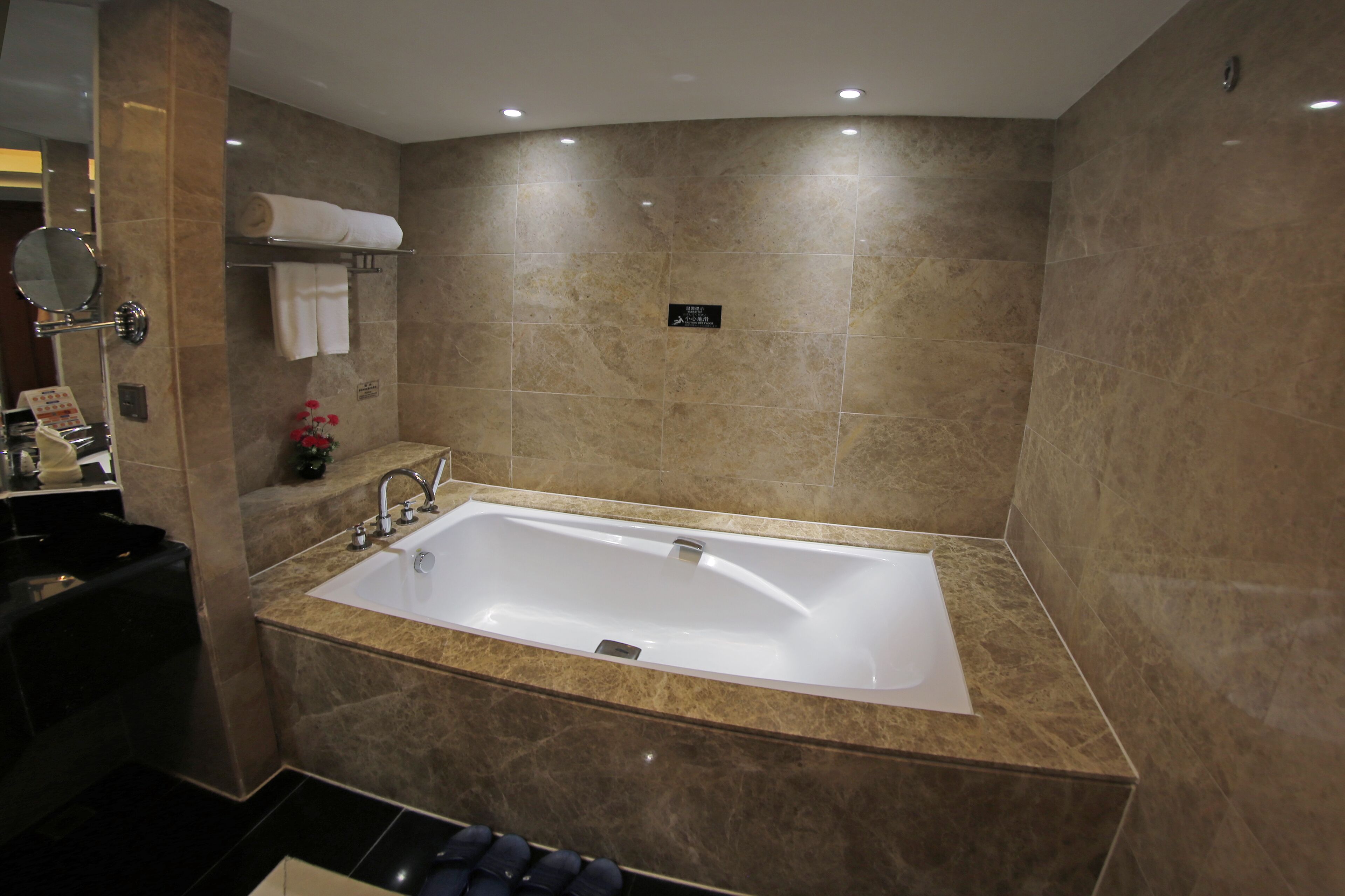 deluxe room | bathroom | shower, rainfall showerhead, free toiletries, hair dryer