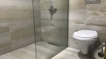 Shower, free toiletries, hair dryer, slippers