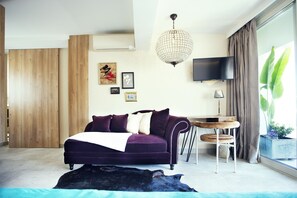Apartamento, 1 quarto, terraço | Área de estar
